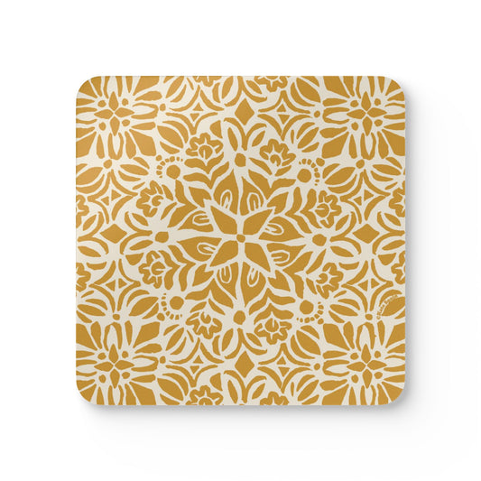 Square coaster with a yellow floral pattern on a white background