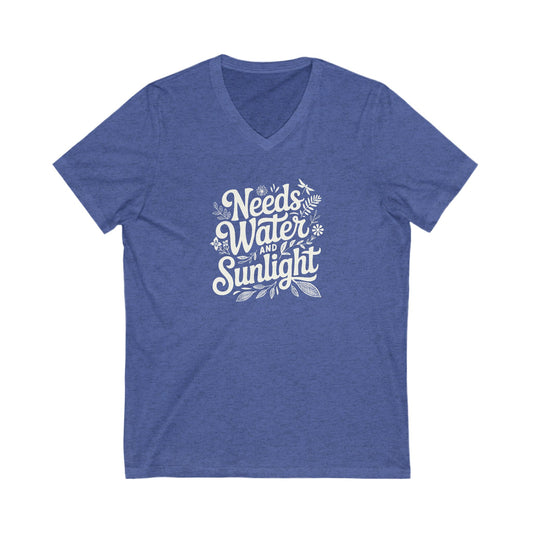 Royal Blue heather colored vneck t-shirt with white words that say 'Needs Water and Sunlight' in script style text with dragonfly, flower and leaf illustrations around the words.