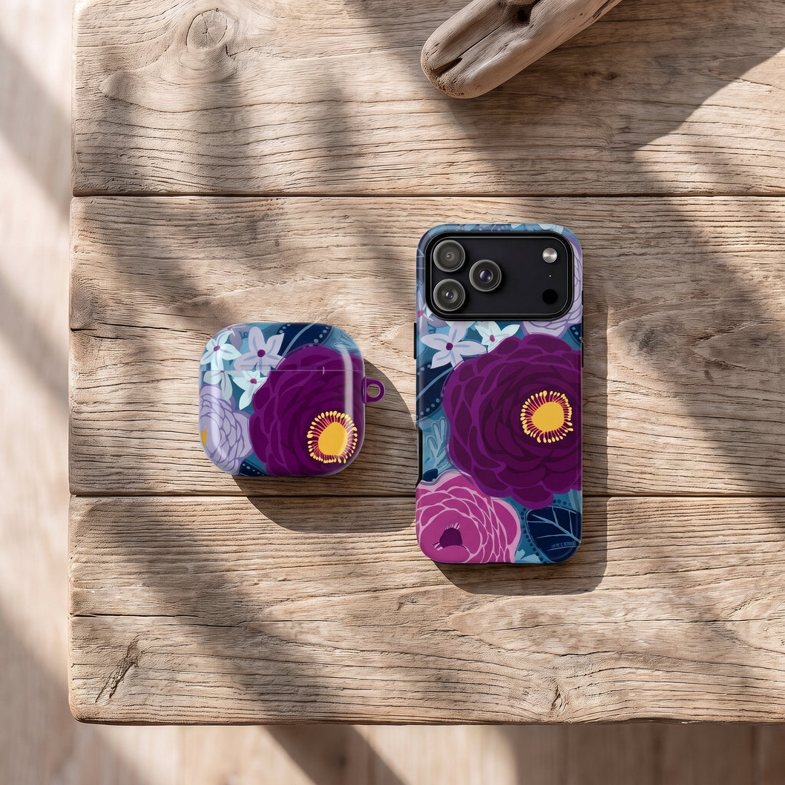 New Bloomerie Violet AirPods case and iPhone case — deep purple botanical floral phone case by artist Kate Spain for Floriori