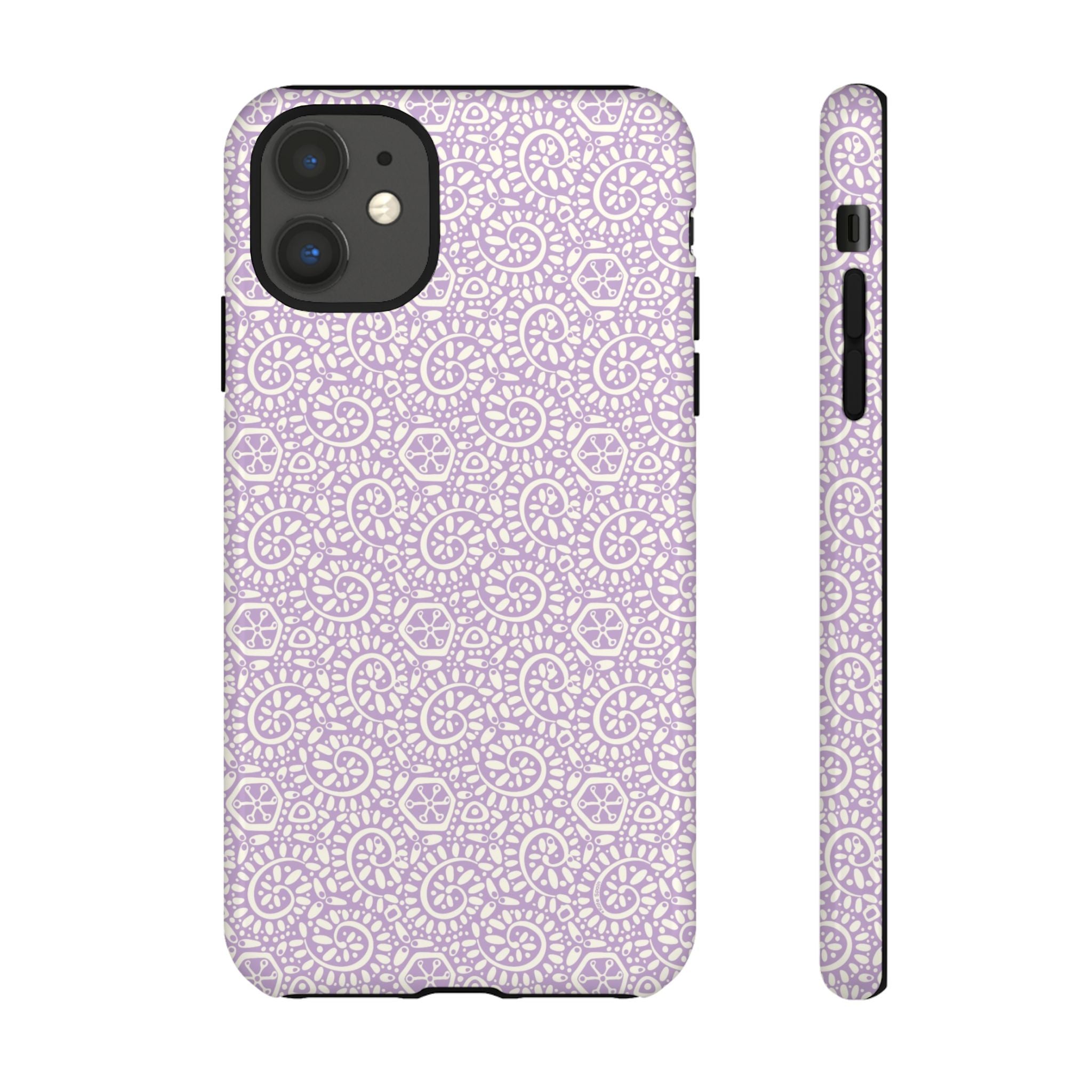 Canto Swirls Lavender iPhone 11 Glossy Case — lavender hard case covered in an intricate folk-art medallion pattern of radiating circular motifs, dot clusters, and geometric centers