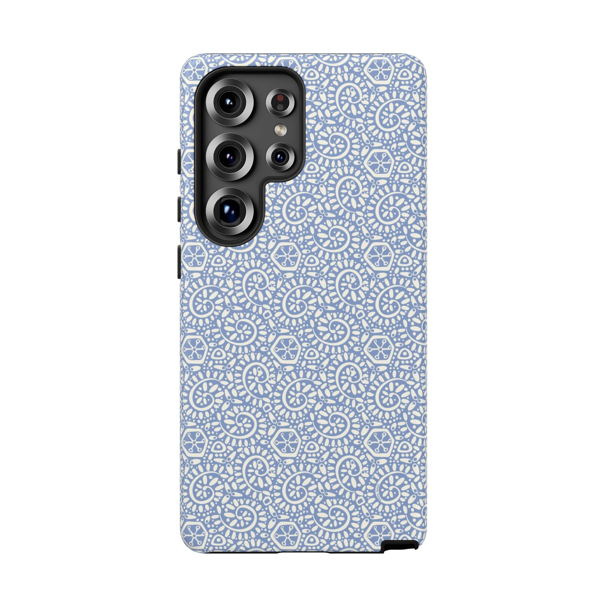 Canto Swirls Mist Samsung Galaxy S25 Ultra Matte Case — periwinkle blue hard case covered in an intricate folk-art medallion pattern of radiating white circular motifs, dot clusters, and geometric centers