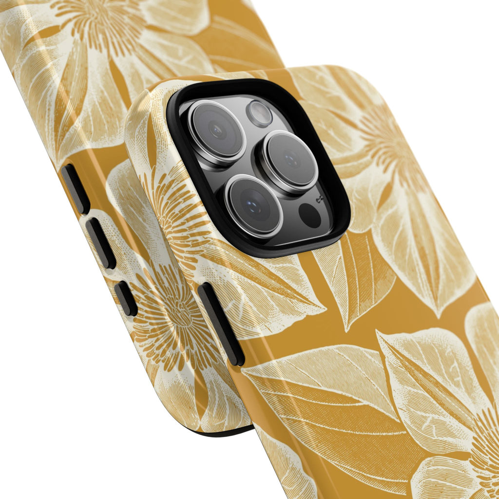 Vintage Bloom Gold iPhone 16 Pro Max case – Glossy | gold ground, large-scale cream clematis print, angled view showing camera cutout and buttons, dual-layer protection