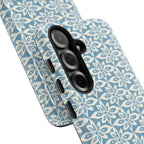 Lily Blue Samsung Galaxy S25 Glossy case — side angled view showing camera cutout and buttons — graphic white lily on cerulean by Kate Spain