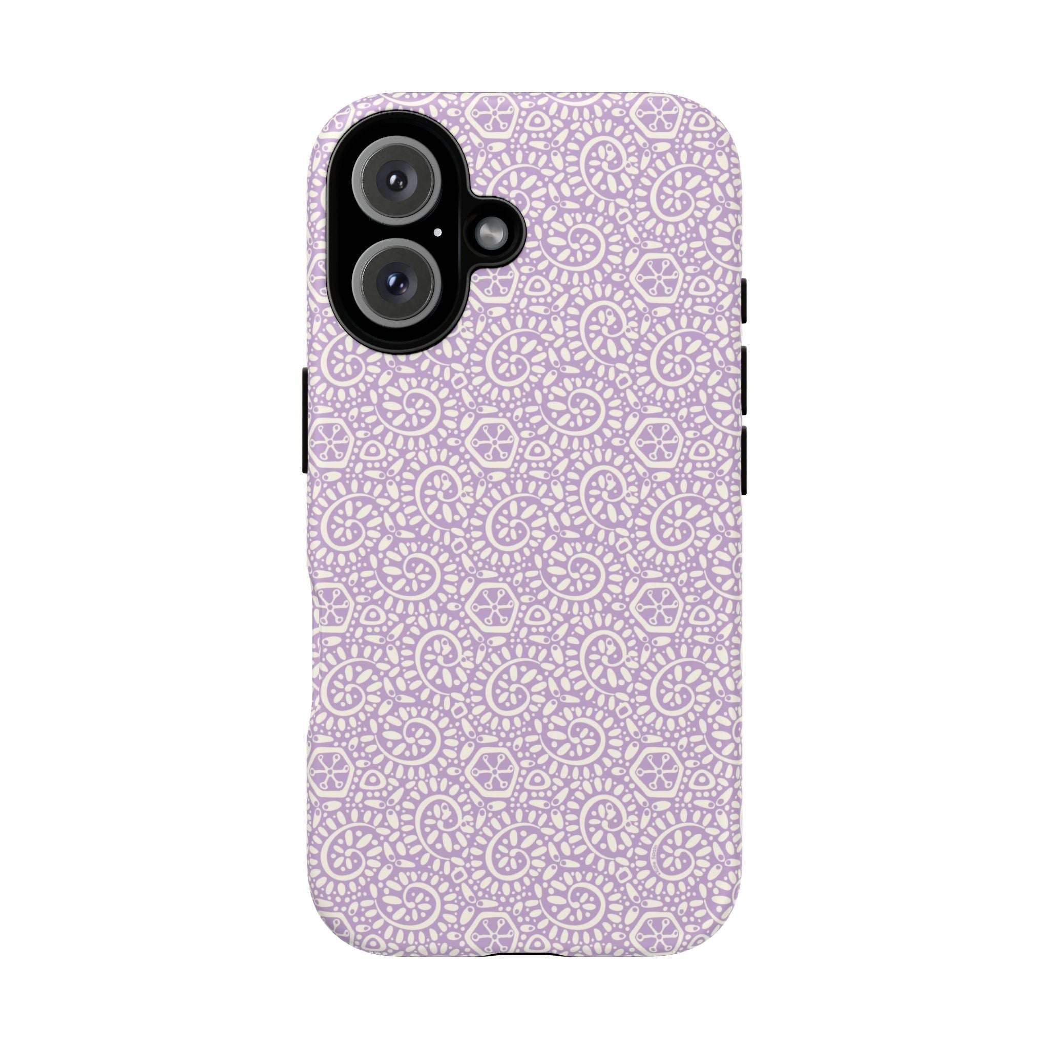 Canto Swirls Lavender iPhone 16 Matte Case — lavender hard case covered in an intricate folk-art medallion pattern of radiating circular motifs, dot clusters, and geometric centers