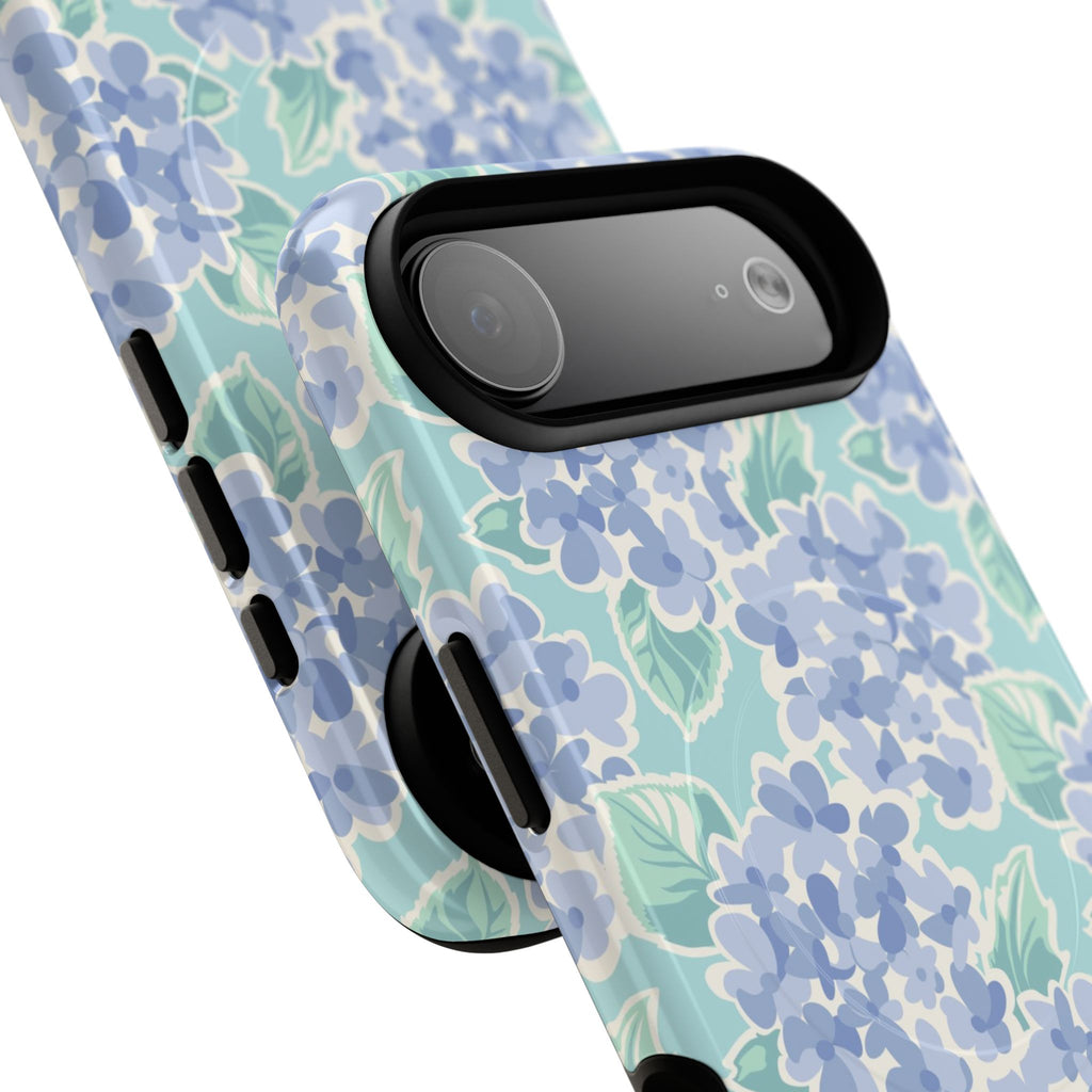 Nantucket Hydrangea MagSafe iPhone Case – lifestyle angled view of button, ports, and camera cutout. Shows raised bezel edges around camera lens.