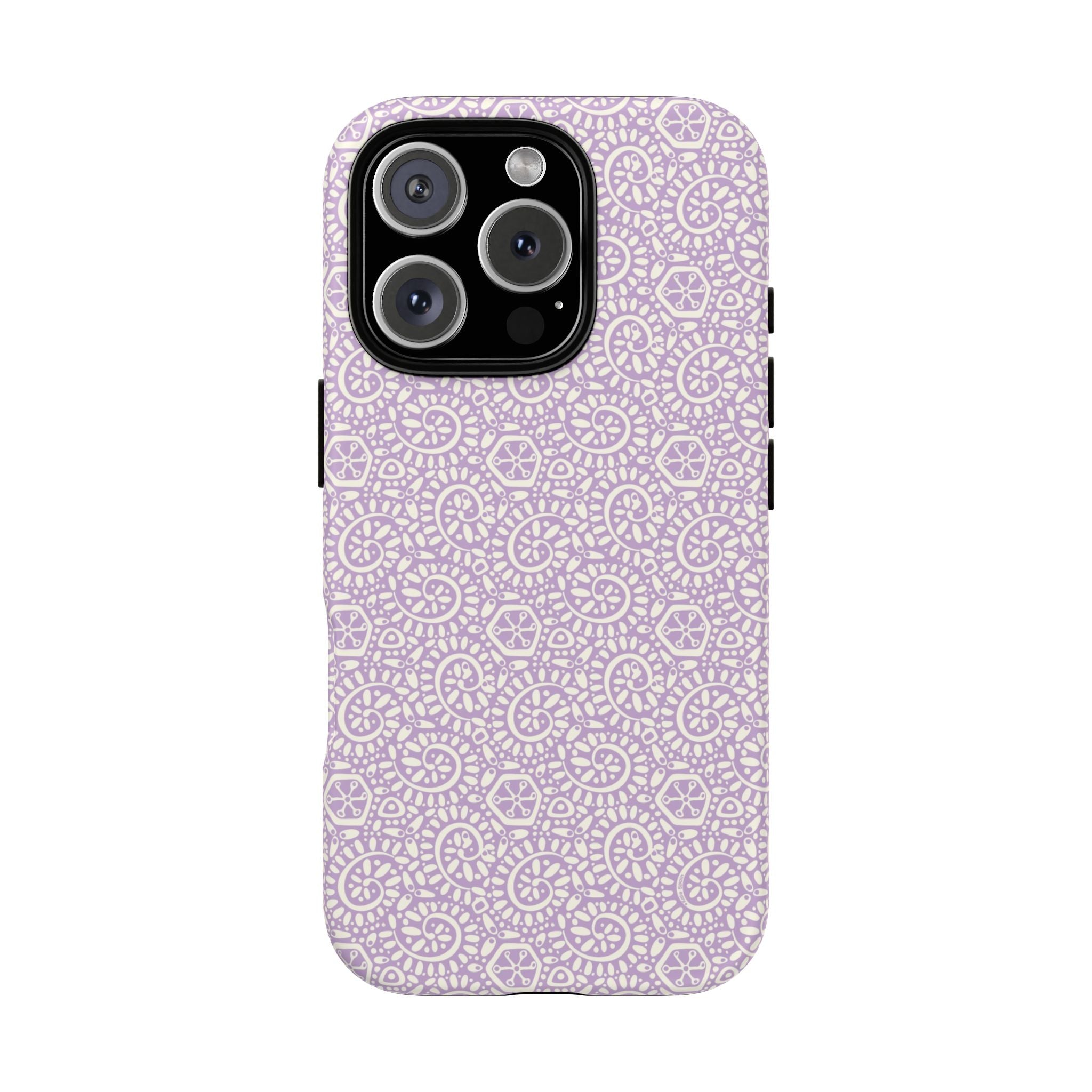 Canto Swirls Lavender iPhone 16 Pro Matte Case — lavender hard case covered in an intricate folk-art medallion pattern of radiating circular motifs, dot clusters, and geometric centers