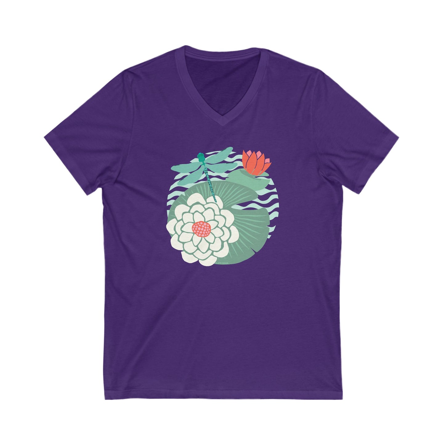 Illustrated dragonfly hovering over a green lily pad with pink and white water lily flowers on a calm pond, printed on a soft saturated purple vneck t-shirt.