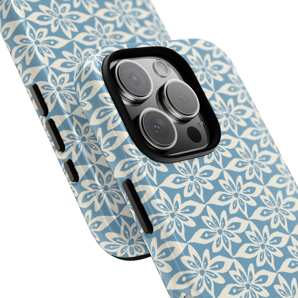 Lily Blue iPhone 17 Case – Glossy | angled view showing camera cutout and buttons — botanical phone case by Kate Spain