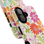 Terrain Day MagSafe iPhone 17 Case – Glossy | white, magenta, coral botanical woodland floral print | angled view closeup of camera cutout and buttons
