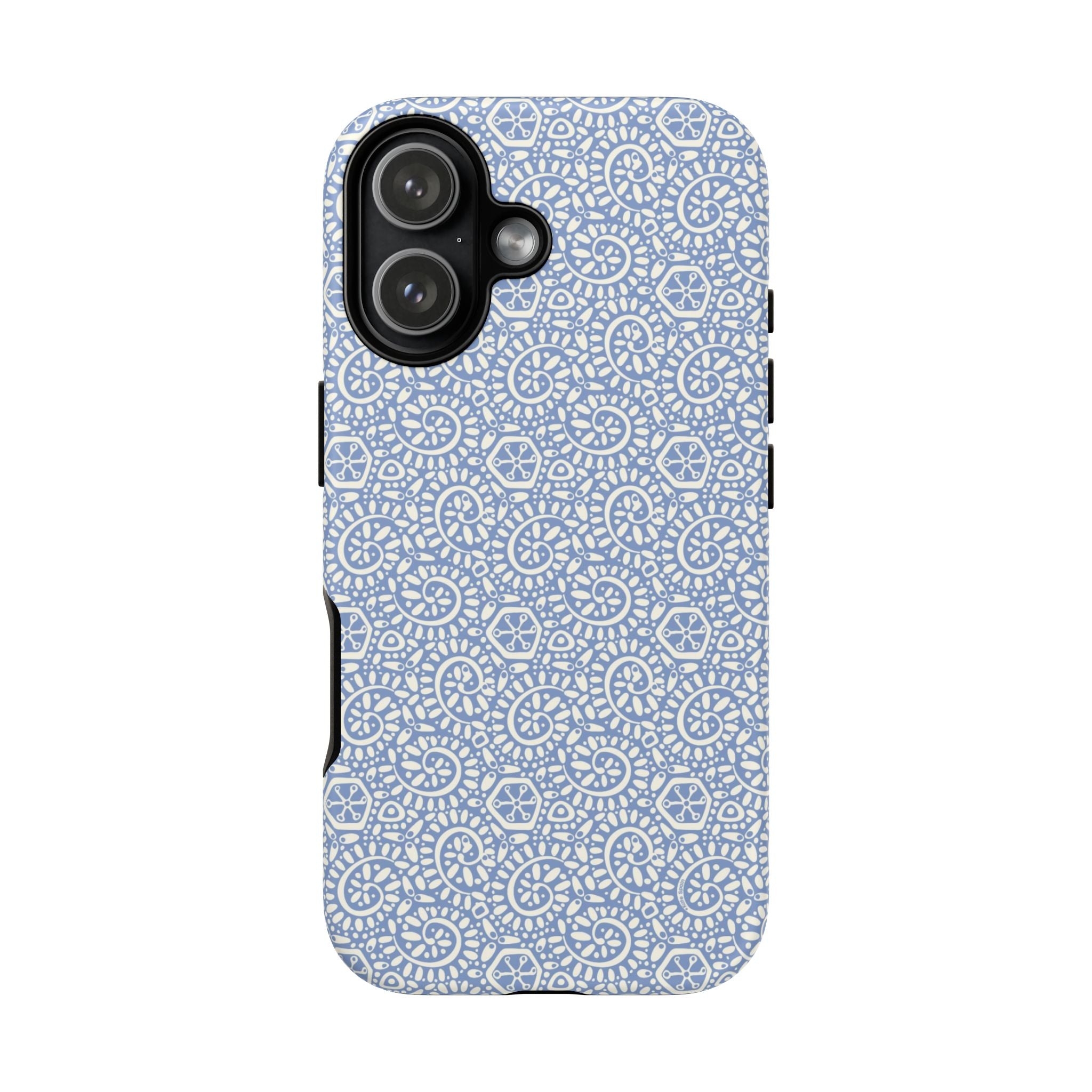 Canto Swirls Mist iPhone 16 Pro Max Matte Case — periwinkle blue hard case covered in an intricate folk-art medallion pattern of radiating white circular motifs, dot clusters, and geometric centers
