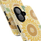 Sunny Sunflower iPhone 17 case – Glossy | cream ground, large-scale yellow sunflower print, angled view showing camera cutout and buttons, dual-layer protection
