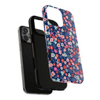 Primrose MagSafe iPhone 16 Pro Max Case – Dual-layered view of case and inner lining in front of phone, with view of camera cutout and buttons | navy, pink, white ditsy floral print