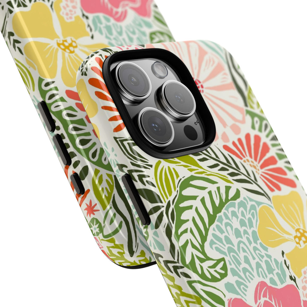 Tropica Tough iPhone 16 Pro Max Case – lifestyle/angled case in cream, pink, yellow, blue botanical floral print