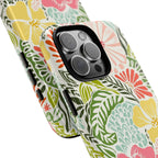 Tropica Tough iPhone 16 Pro Max Case – lifestyle/angled case in cream, pink, yellow, blue botanical floral print