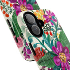 Posy MagSafe iPhone 17 Case – Dual-layered view of case and inner lining in front of phone, with view of camera cutout and buttons | cream, magenta, coral botanical floral print