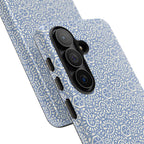 Canto Swirls Mist Samsung Galaxy S26 Case — angled view showing slim profile; periwinkle blue folk-art medallion pattern