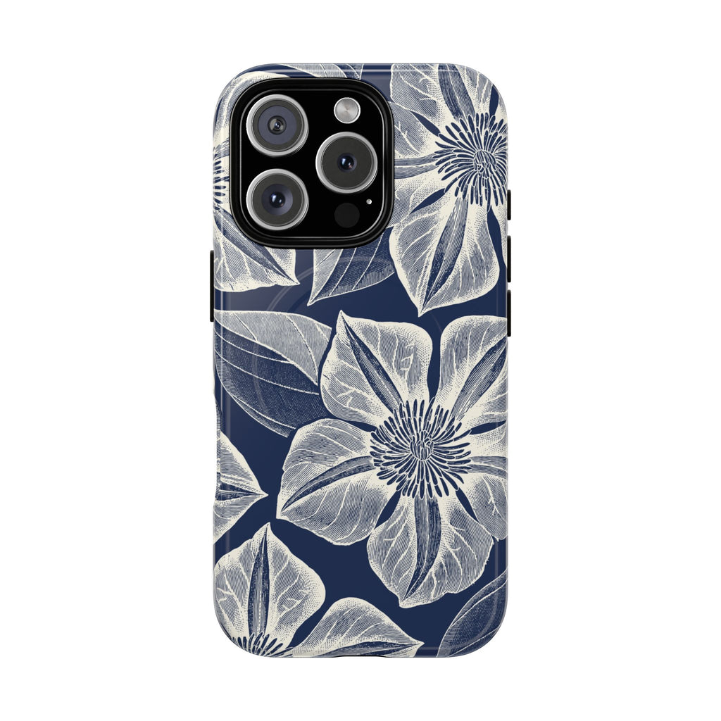 Vintage Bloom Navy MagSafe iPhone 16 Pro Case – Glossy | navy ground, large-scale white clematis print, engraved petal detail, dual-layer protection
