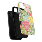 Tropica MagSafe iPhone 17 Case – Dual-layered view of case and inner lining in front of phone, with view of camera cutout and buttons | yellow, coral, pink, green botanical tropical floral print