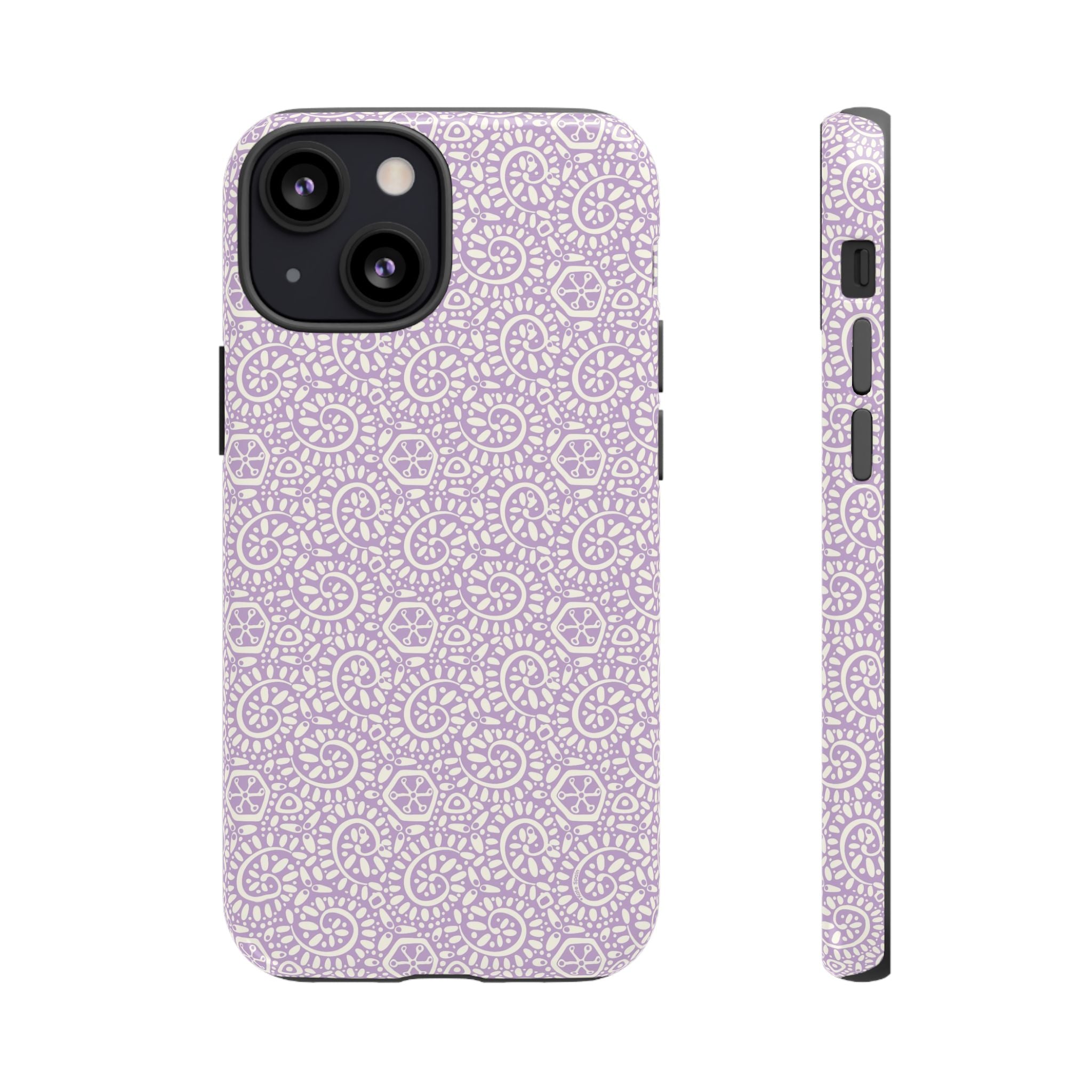 Canto Swirls Lavender iPhone 13 Mini Glossy Case — lavender hard case covered in an intricate folk-art medallion pattern of radiating circular motifs, dot clusters, and geometric centers