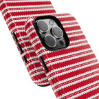 Candy Cane Stripe Tough iPhone 16 Pro Max Case – lifestyle angled view | red, cream scalloped candy cane stripe print