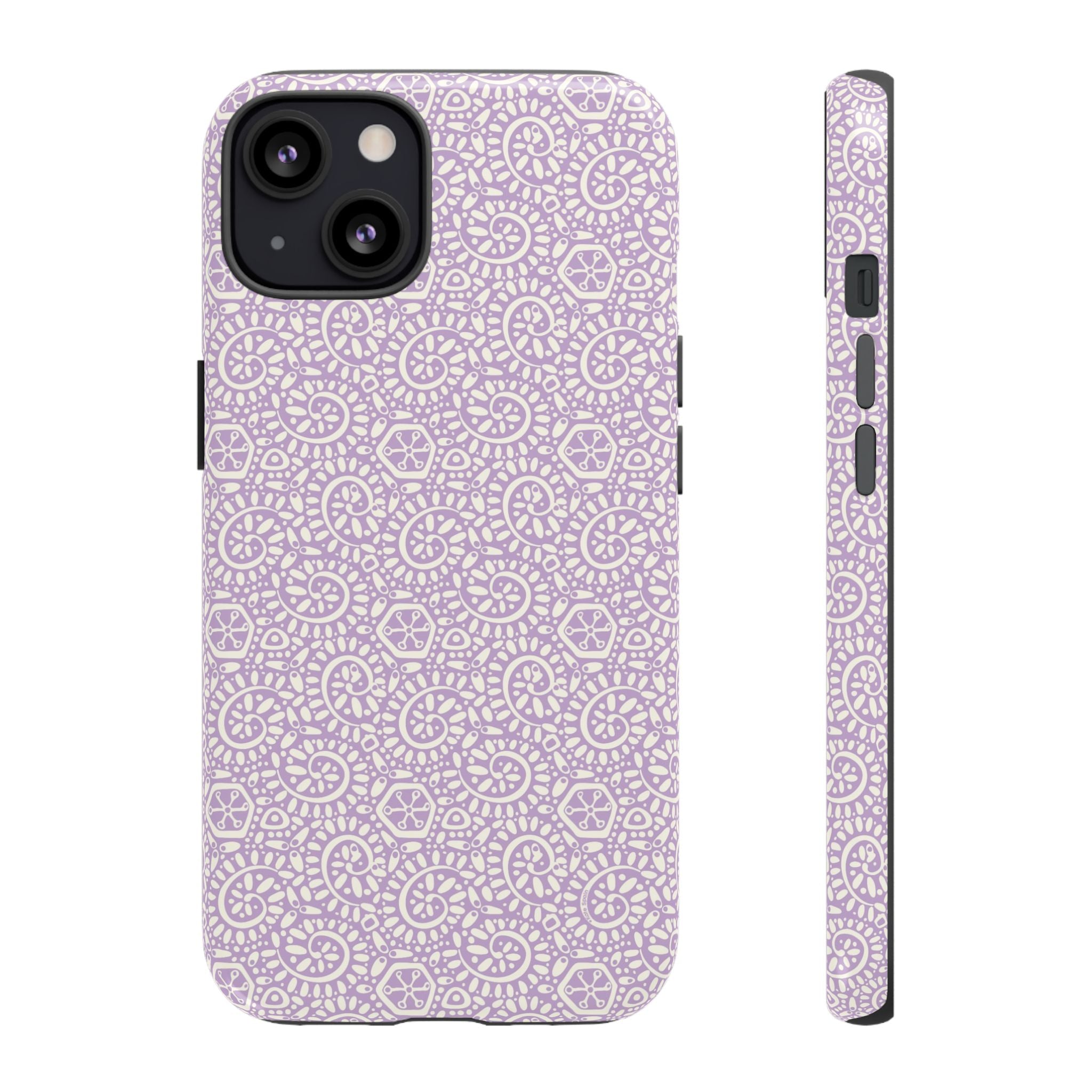 Canto Swirls Lavender iPhone 13 Glossy Case — lavender hard case covered in an intricate folk-art medallion pattern of radiating circular motifs, dot clusters, and geometric centers