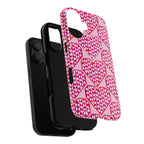 Pink Pyramid Heart Tough iPhone Case – lifestyle angled view | blush, pink, magenta, red geometric pyramid heart print