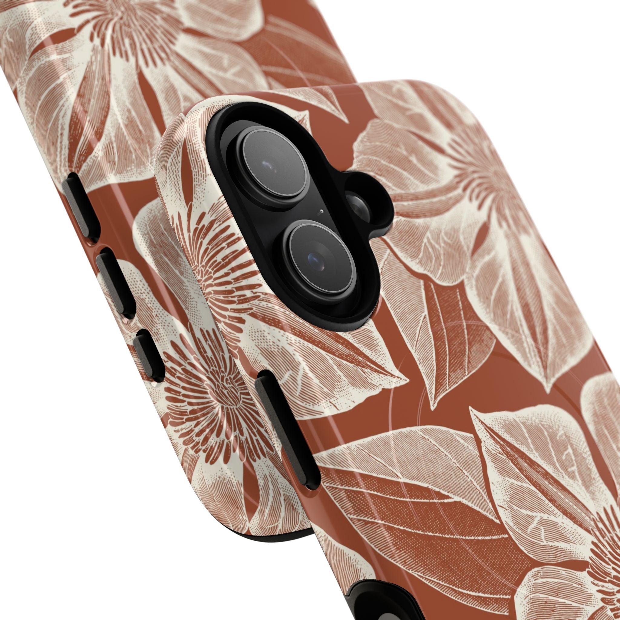 Vintage Bloom Sienna MagSafe iPhone 17 – Glossy | sienna ground, large-scale cream clematis print, angled view showing camera cutout and buttons, dual-layer protection