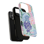 Tropica MagSafe iPhone 16 Pro Max Case – Dual-layered view of case and inner lining in front of phone, with view of camera cutout and buttons | purple, coral, pink, blue botanical tropical floral print