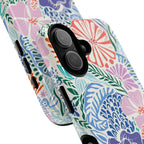 Tropica MagSafe iPhone 17 Case – Glossy | purple, coral, pink, blue botanical tropical floral print | angled view closeup of camera cutout and buttons