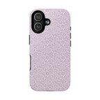 Canto Swirls Lavender MagSafe iPhone 17 Glossy Case — lavender hard case covered in an intricate folk-art medallion pattern of radiating circular motifs, dot clusters, and geometric centers