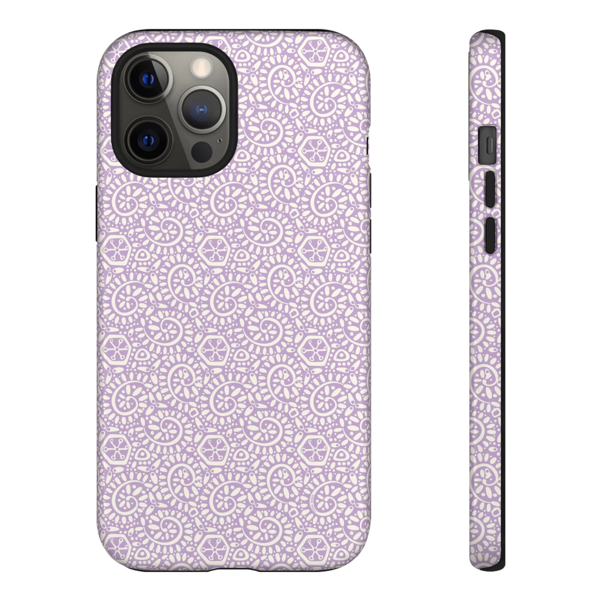 Canto Swirls Lavender iPhone 12 Pro Max Glossy Case — lavender hard case covered in an intricate folk-art medallion pattern of radiating circular motifs, dot clusters, and geometric centers