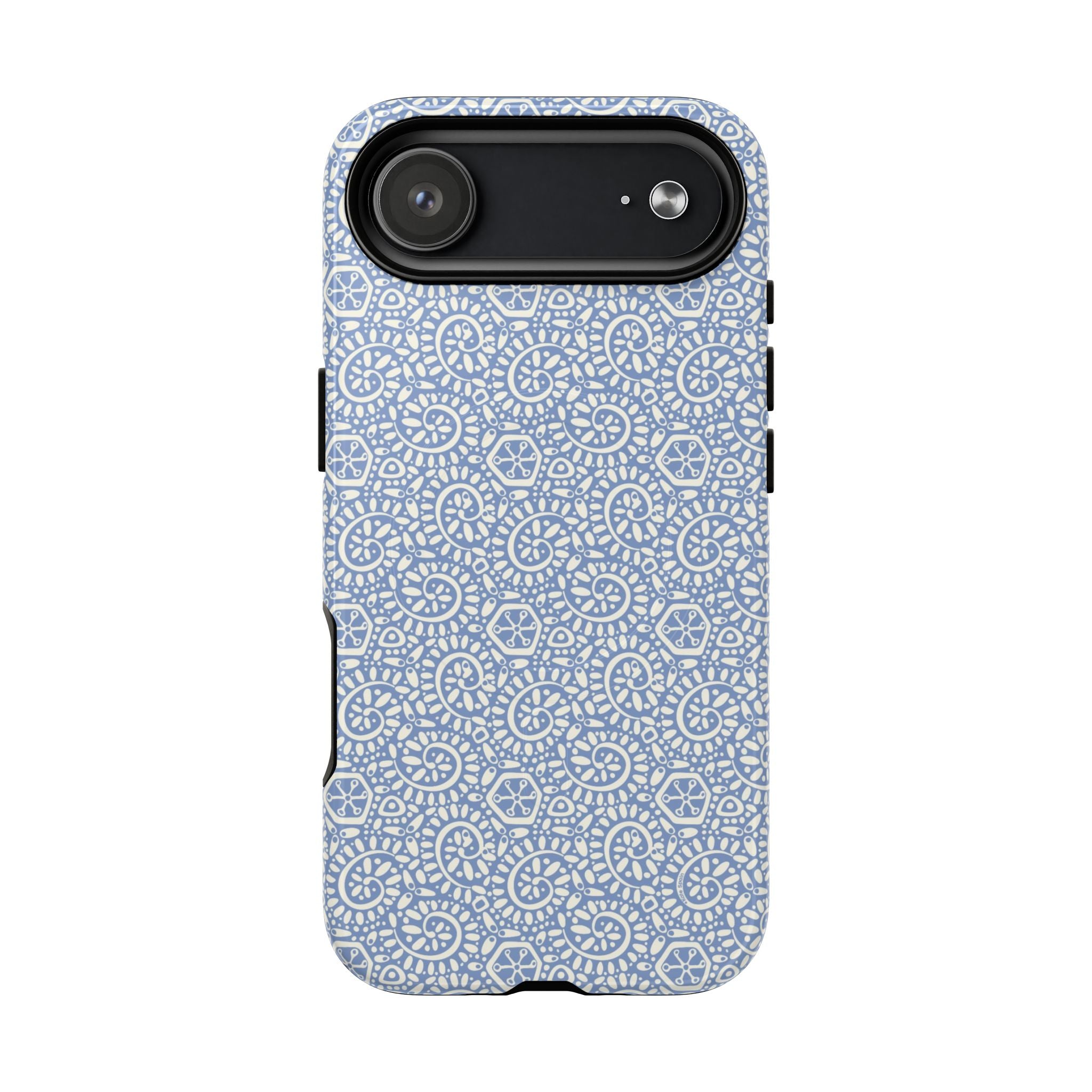Canto Swirls Mist MagSafe iPhone 17 Air Glossy Case — periwinkle blue hard case covered in an intricate folk-art medallion pattern of radiating white circular motifs, dot clusters, and geometric centers