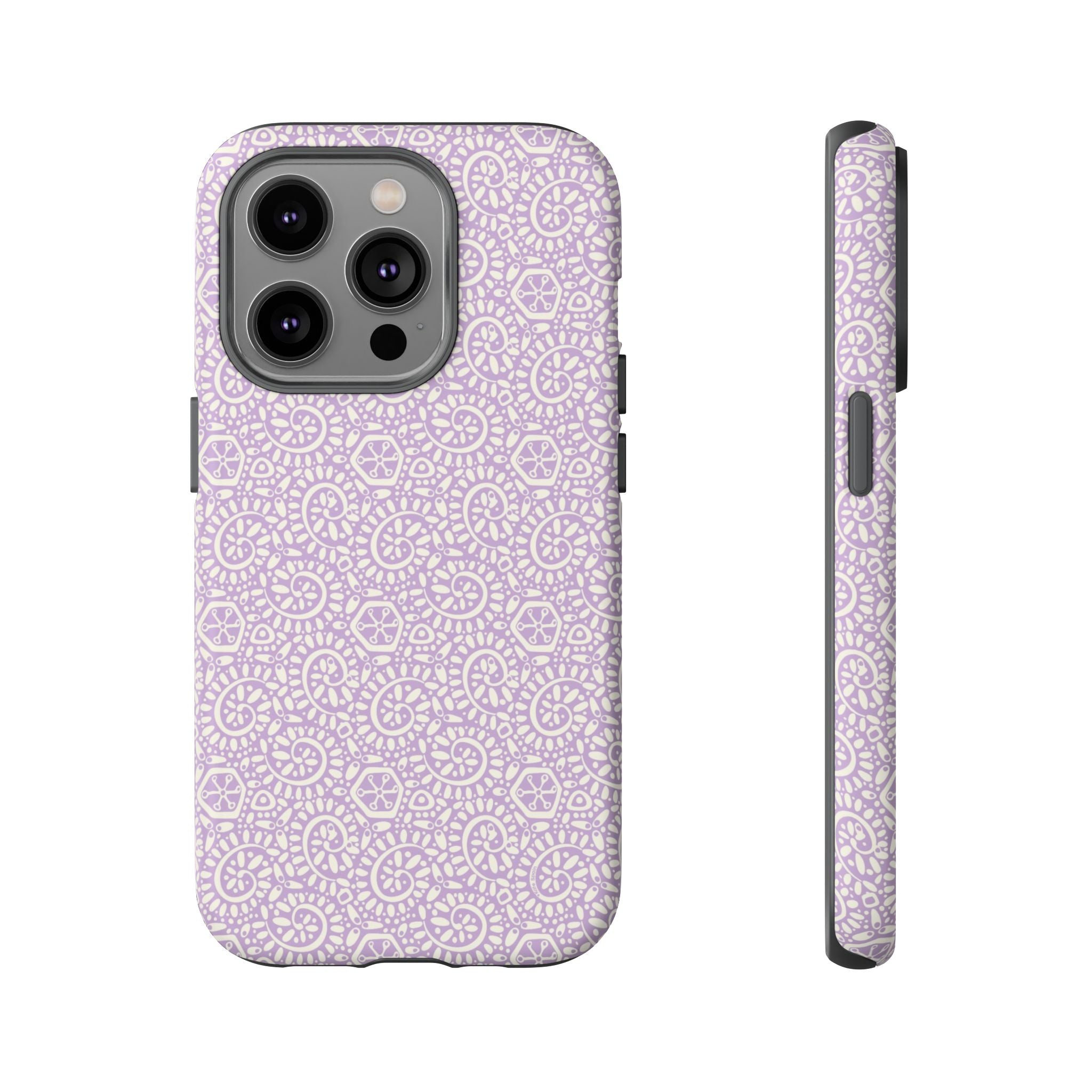 Canto Swirls Lavender iPhone 14 Pro Matte Case — lavender hard case covered in an intricate folk-art medallion pattern of radiating circular motifs, dot clusters, and geometric centers