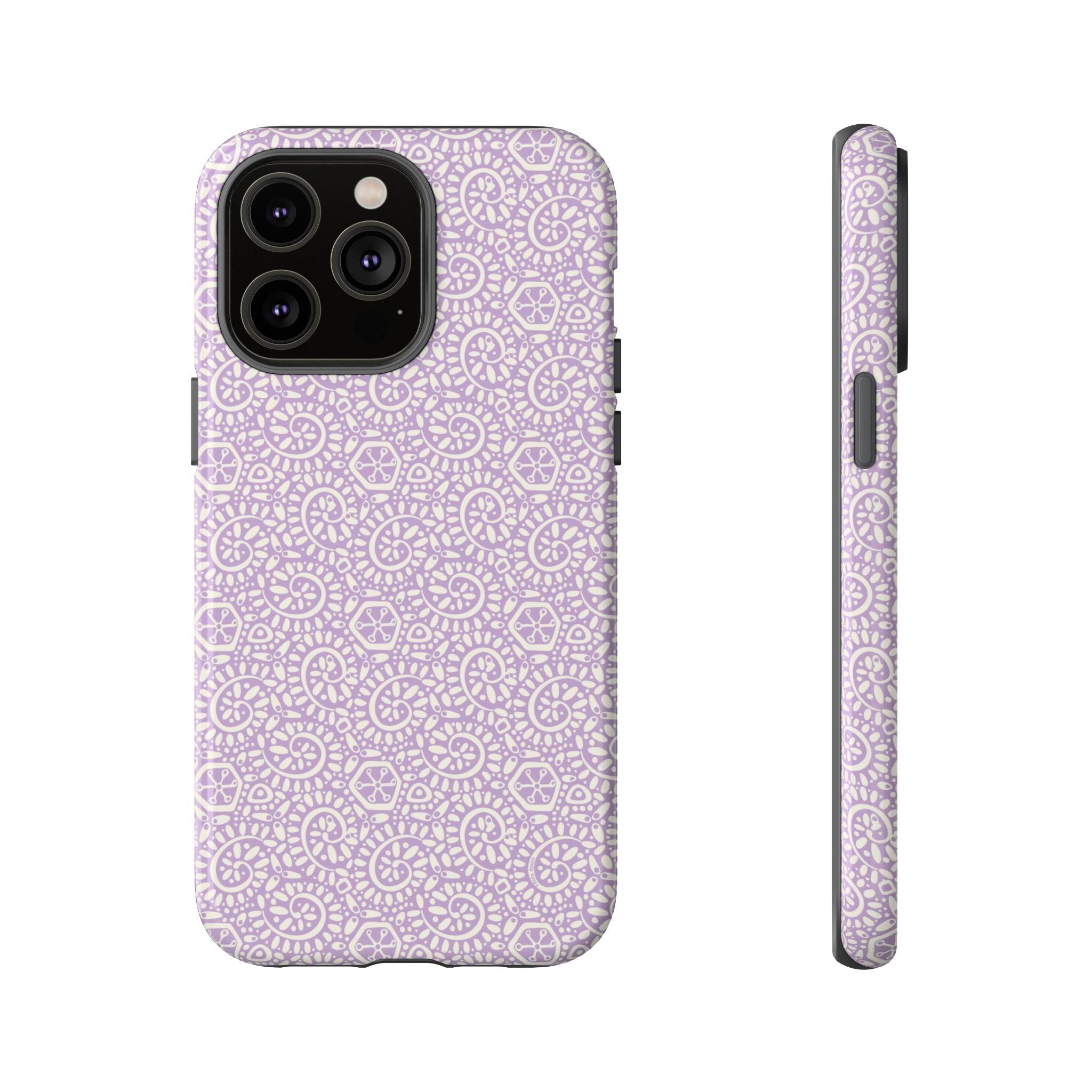 Canto Swirls Lavender iPhone 14 Pro Max Glossy Case — lavender hard case covered in an intricate folk-art medallion pattern of radiating circular motifs, dot clusters, and geometric centers