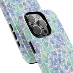 Nantucket Hydrangea MagSafe iPhone Case – lifestyle angled view of button, ports, and camera cutout. Shows raised bezel edges around camera lens.