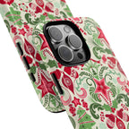 Wonderland Tough iPhone 16 Pro Max Case – lifestyle/angled shot | cream, red, green Christmas ornament damask print