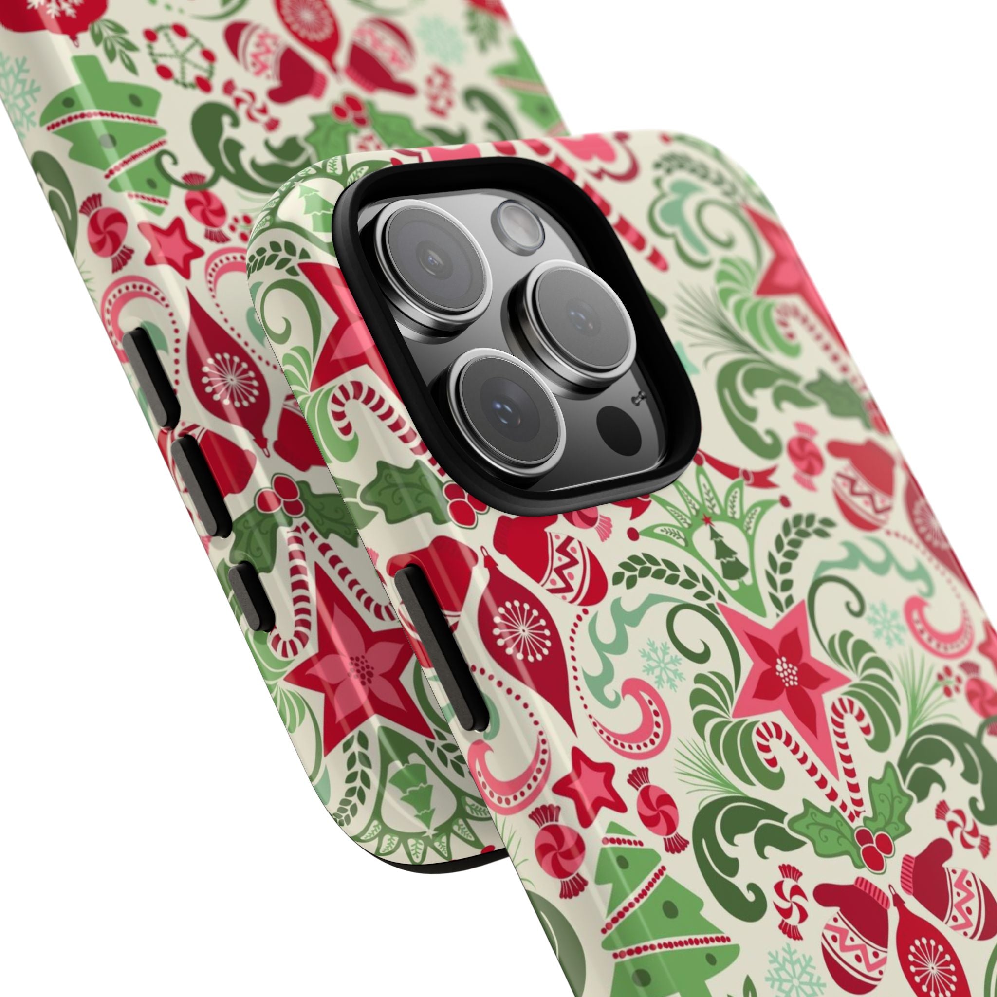 Wonderland Tough iPhone 16 Pro Max Case – lifestyle/angled shot | cream, red, green Christmas ornament damask print