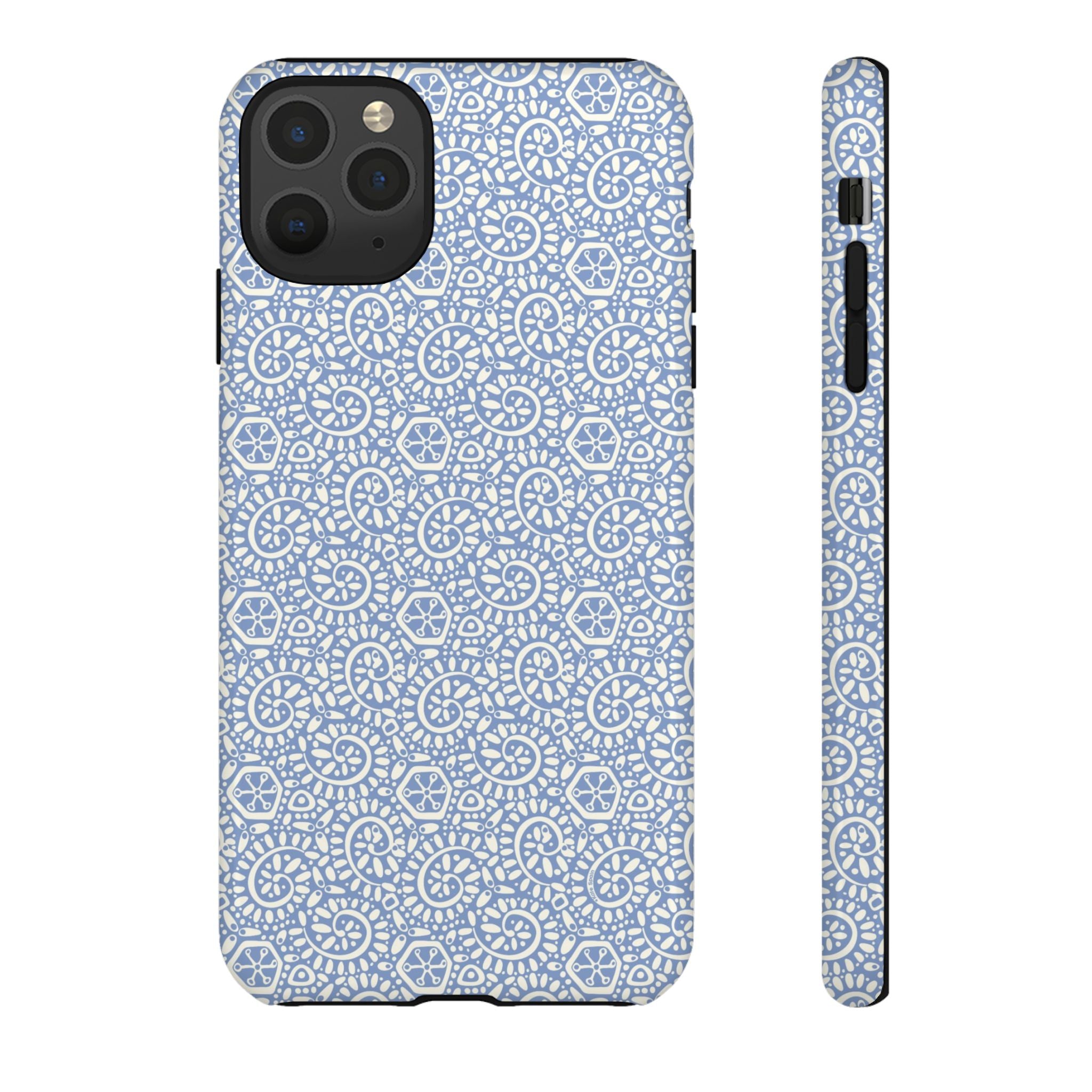 Canto Swirls Mist iPhone 11 Pro Max Glossy Case — periwinkle blue hard case covered in an intricate folk-art medallion pattern of radiating white circular motifs, dot clusters, and geometric centers