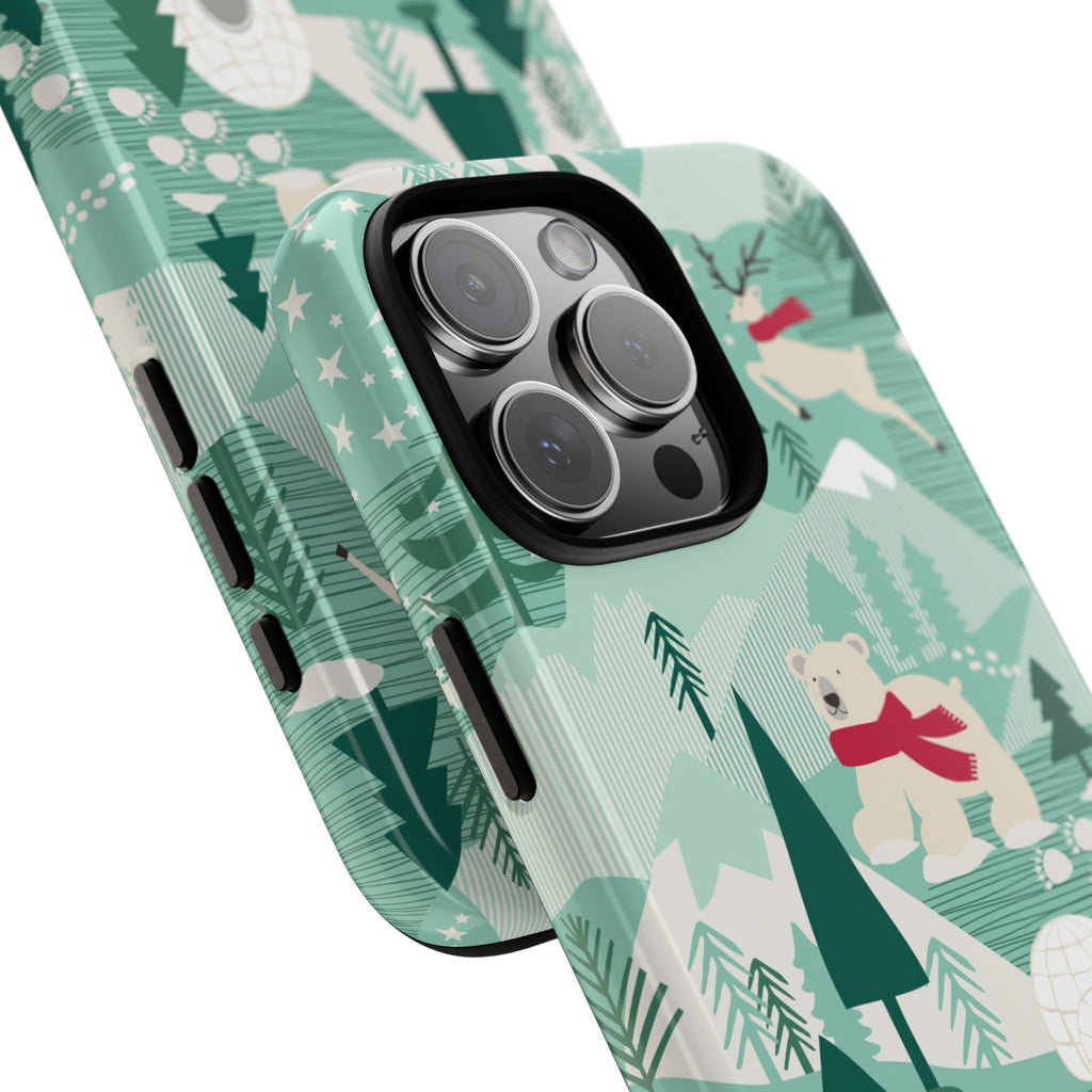 Arctica Winter Tough iPhone 16 Pro Max Case – lifestyle angled view | aqua, evergreen, white, animal frolic winter wonderland print