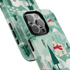 Arctica Winter Tough iPhone 16 Pro Max Case – lifestyle angled view | aqua, evergreen, white, animal frolic winter wonderland print