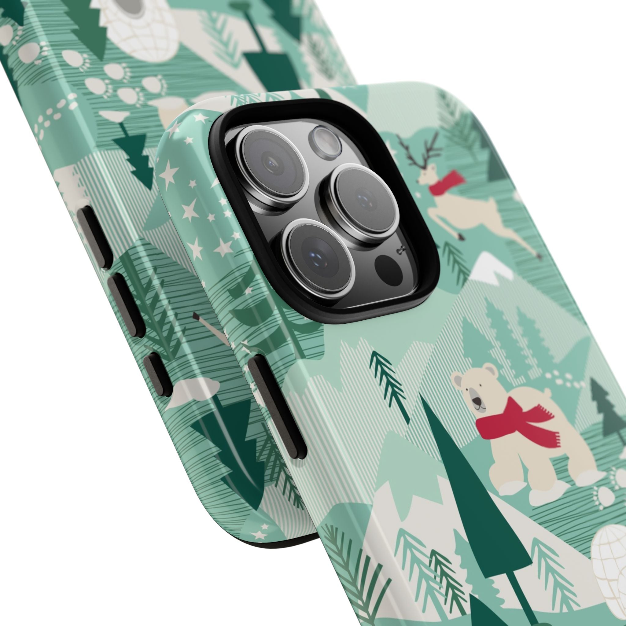 Arctica Winter Tough iPhone 16 Pro Max Case – lifestyle angled view | aqua, evergreen, white, animal frolic winter wonderland print