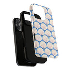 Seashells Tough iPhone 16 Pro Max Case – lifestyle angled shot | periwinkle, cream, blush scallop shell print