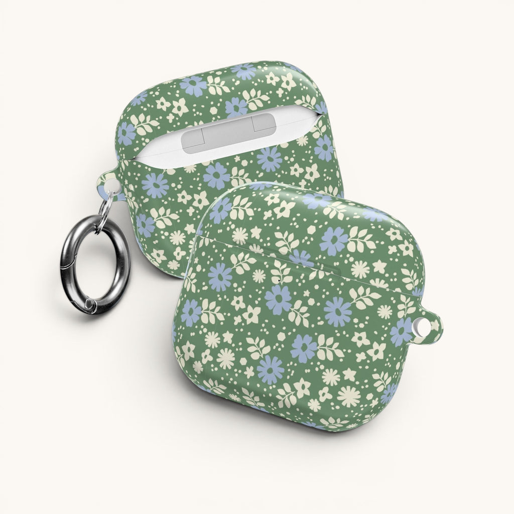 AirPods Gen 4 case – Glossy | periwinkle and cream ditsy flowers on sage green ground — side view with keychain ring attached