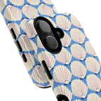 Seashells MagSafe iPhone 17 Case – Glossy | periwinkle, cream, blush scallop shell print | angled view closeup of camera cutout and buttons