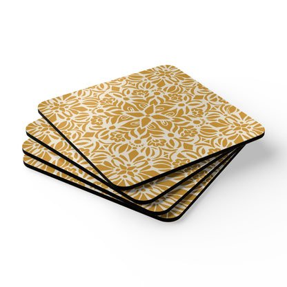 Set of four square coasters with a yellow floral pattern on a white background