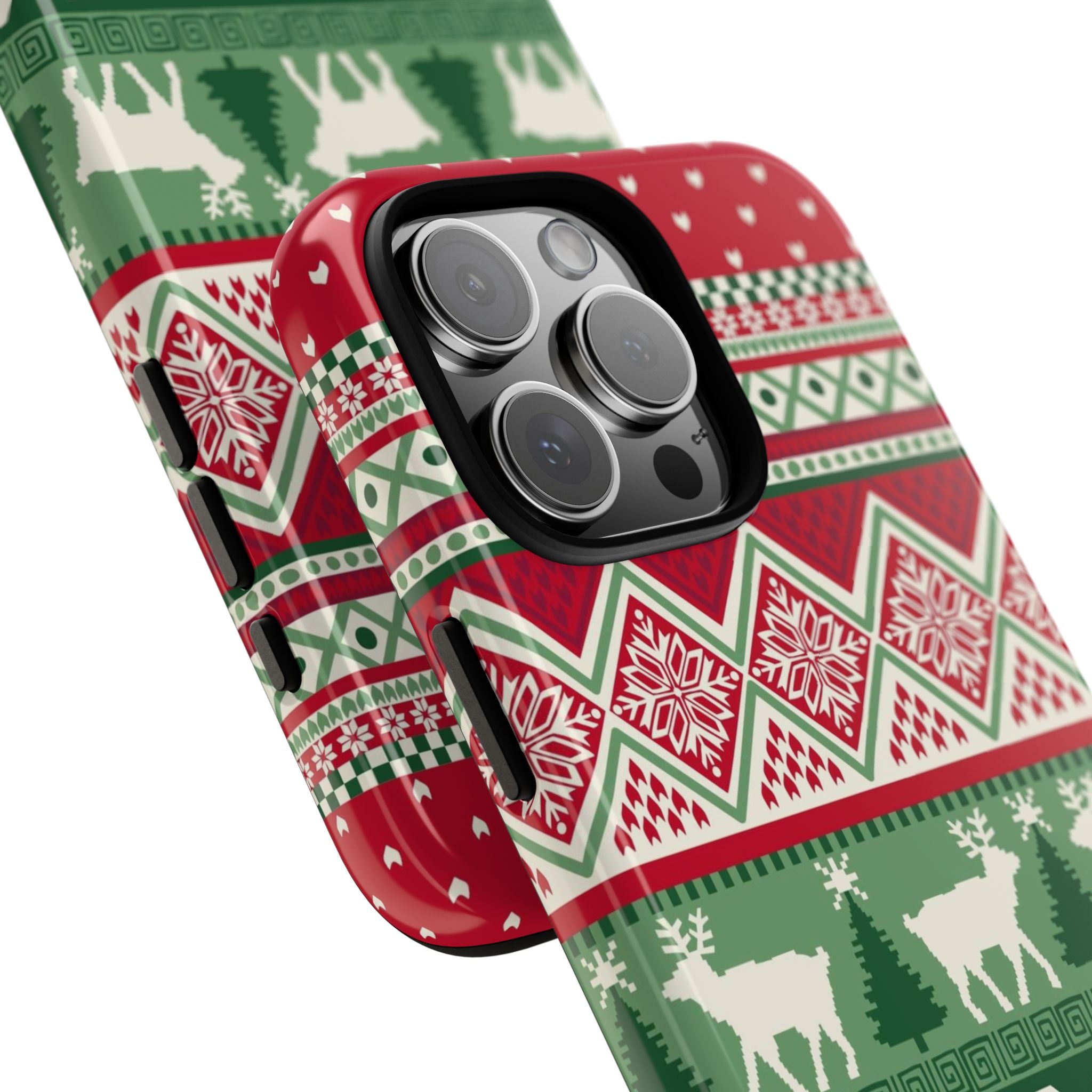 Telemark Tough iPhone 16 Pro Max Case – lifestyle/angled shot | red, green, cream fair isle reindeer Nordic print