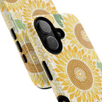 Sunny Sunflower MagSafe iPhone 17 – Glossy | cream ground, large-scale yellow sunflower print, angled view showing camera cutout and buttons, dual-layer protection