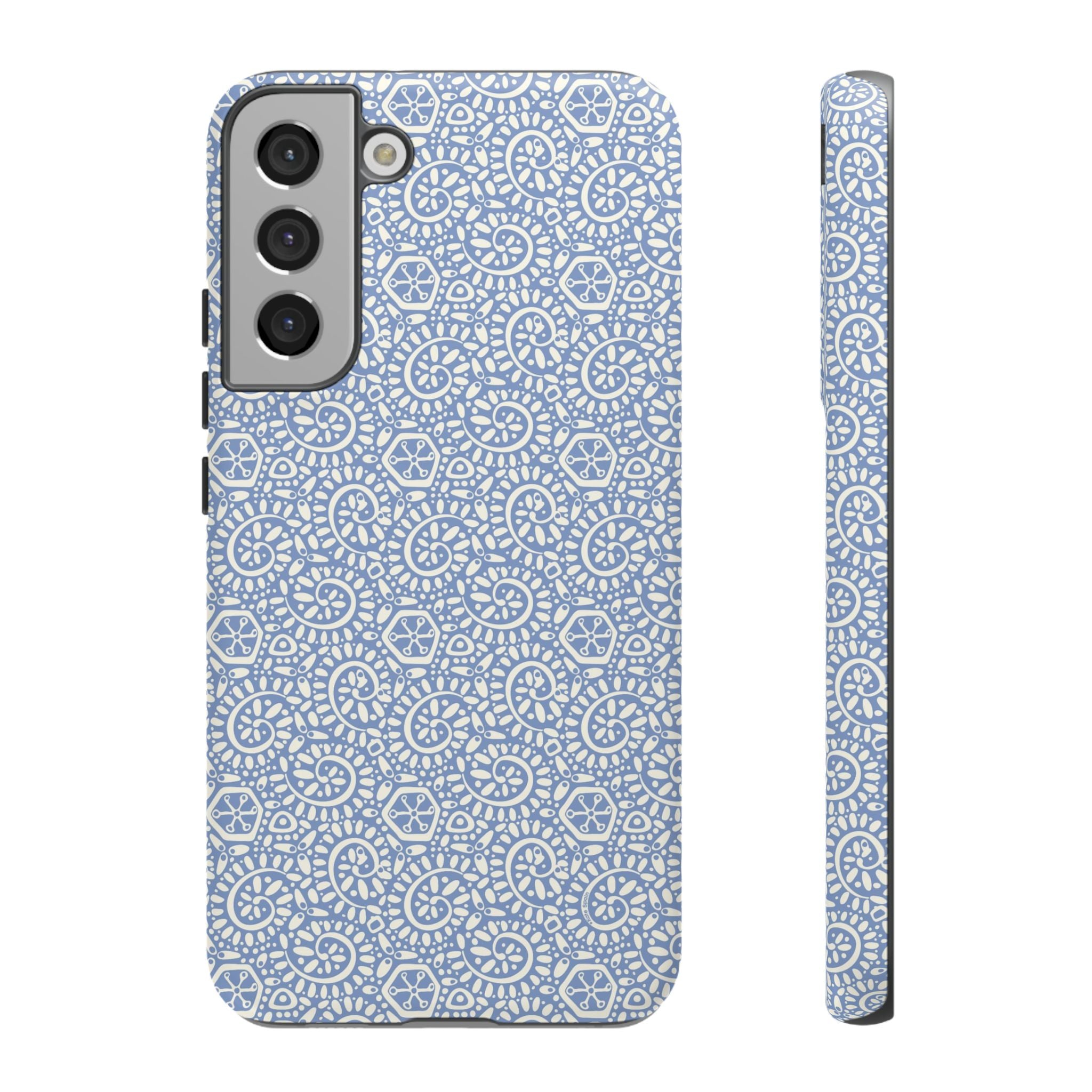 Canto Swirls Mist Samsung Galaxy S22 Plus Matte Case — periwinkle blue hard case covered in an intricate folk-art medallion pattern of radiating white circular motifs, dot clusters, and geometric centers