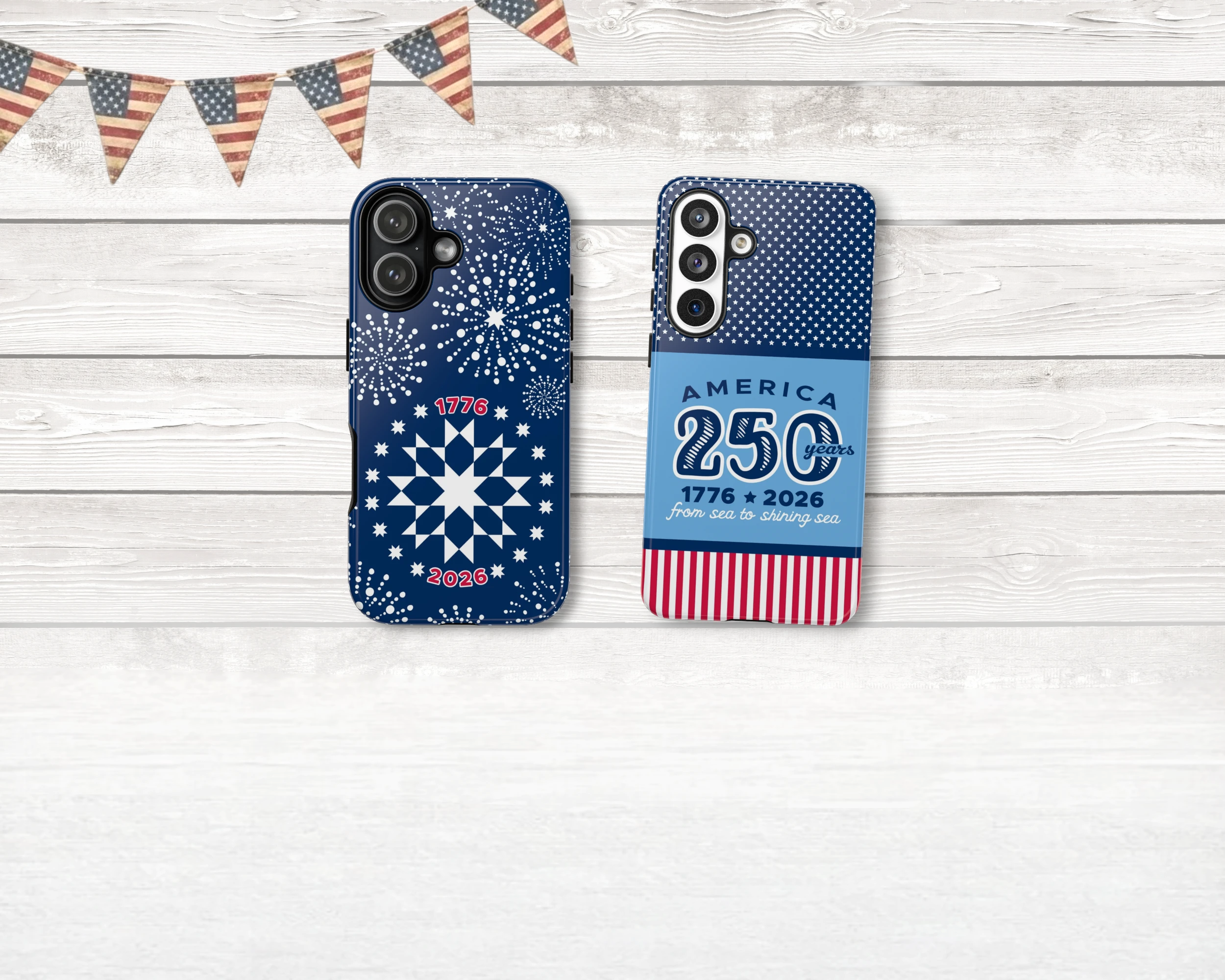 Two phone cases with patriotic designs on a wooden surface.