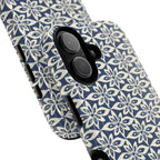 Lily Navy MagSafe iPhone 17 Case – Glossy | angled view showing camera cutout and buttons — botanical MagSafe case by Kate Spain